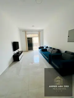 Two master bedrooms, a large living area, a balcony with an open view, central air conditioning, a s