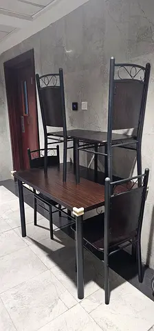 Wooden dining table with 4 chairs - good condition