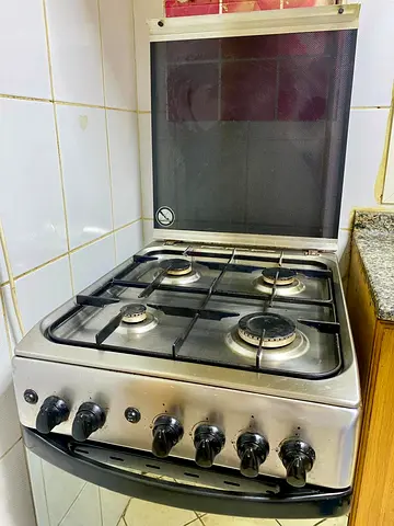 Used 4-Burner Freestanding Gas Stove with Oven - Good Working Condition