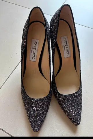 Jimmy Choo glitter pointed-toe pumps — size not specified, gently used