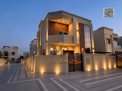 Corner villa for sale in Ajman, Al Yasmeen area | 5 bedrooms, majlis, living room, and maid's room | Freehold ownership for all nationalities | Price