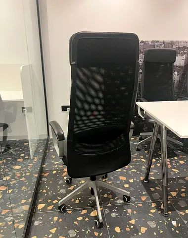 Black high-back ergonomic office chair — good condition