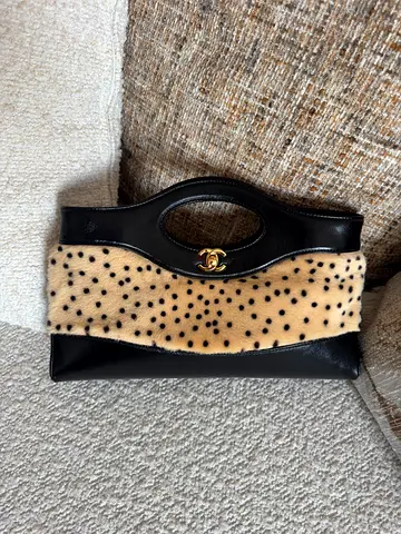 Black Leather Clutch with Spotted Fur Detail and Gold Tone CC Logo