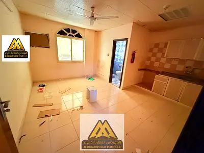 Ground-floor studio in Al Nuaimiya 1, no AC, maintenance by owner, AED 15,007 in 6 payments.