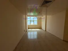 Two-bedroom apartment with a living room for annual rent in Al Majaz 2 Free AC Spacious Master bedro