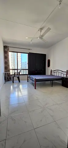 Fully furnished room immediately available for vegetarian bacholor ,Hamdan street,near capital park