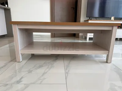 Light wood coffee table with lower shelf - modern, good condition