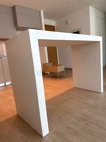Simple modern kitchen island / bar high table in dotted white finish (similar to terrazzo)