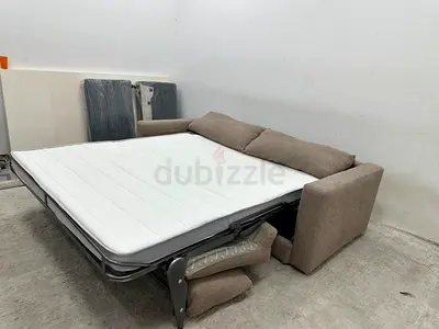 Looks like new condition Italy brand two seater sofa bed