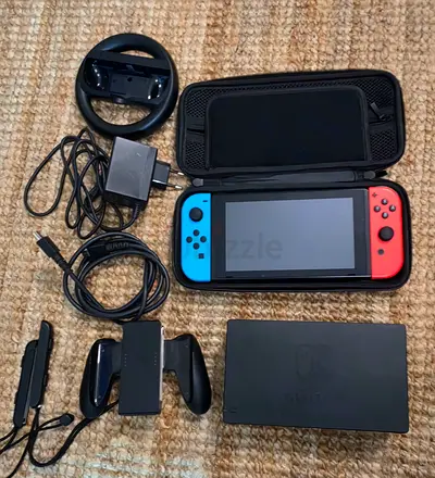 Nintendo Switch console with dock, Joy-Cons, chargers and case - good working condition