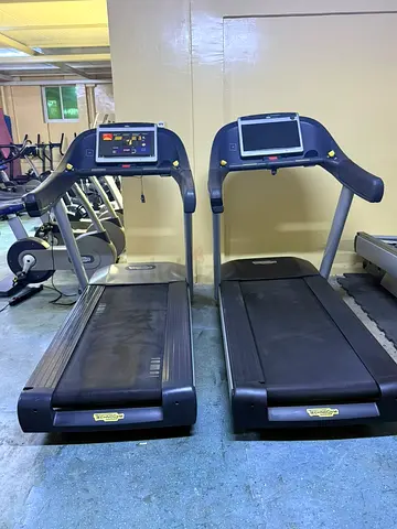 Pair of Technogym Professional Treadmills unitly 700