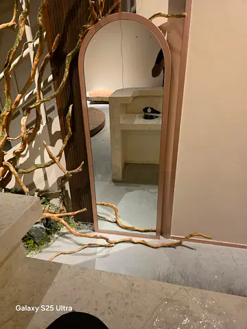 Oval shaped glass mirror