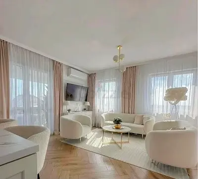 Light beige modern living room sofa set with armchairs and rug - good condition