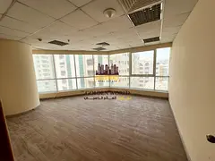 Office in Al Majaz 1, divided into 3 rooms and a reception, with free AC. Annual rent AED 40,000.