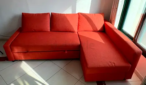 Orange L-shaped Sofa Bed with Storage - Good Condition