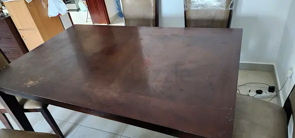 Dining table for sale at AED 50. Seats 6.