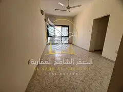 Two-bedroom apartment with a living room and balcony offering an open view; spacious layout with san