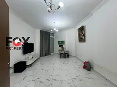 An exceptional, fully furnished 2-bedroom apartment with a living room, featuring 3 balconies, built