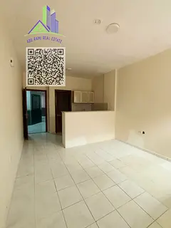 Spacious studio apartment in Al Butina, featuring a separate kitchen and a prime location directly b