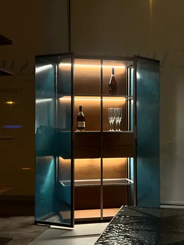 Modern display cabinet with glass doors and wooden drawers