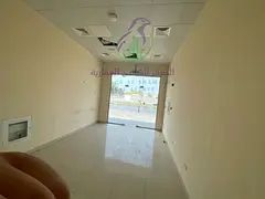 Commercial Shop for Rent in Al Majaz 3 on Al Khalidiyah Street 256 Sq Ft Glass Front Fully Finished