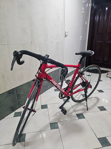 Red Merida Road Bike - Lightweight frame, good condition
