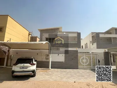 Luxury villa for sale in Al Muweihat 1 | Two floors (Ground + First) | Facing a mosque | Includes electricity, water, and air conditioning Description