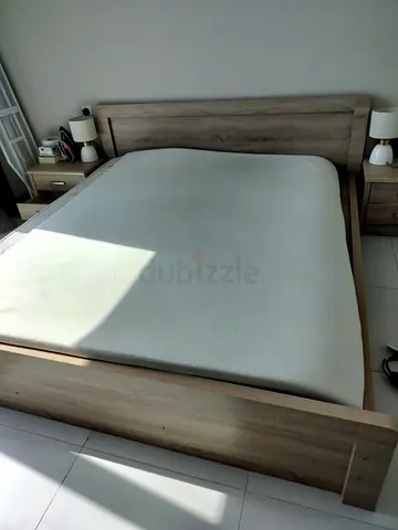 Queen wooden bed frame with headboard and two matching bedside tables