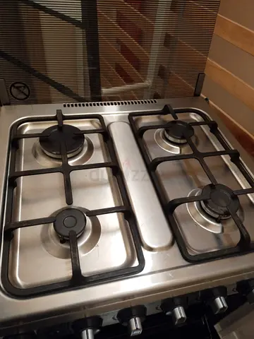 Used 4-Burner Stainless Steel Gas Stove with Oven