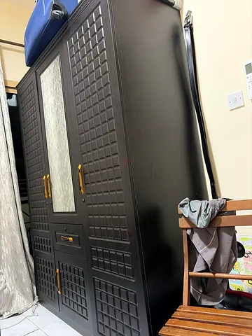 Dark wood 3-door wardrobe with mirror and brass handles