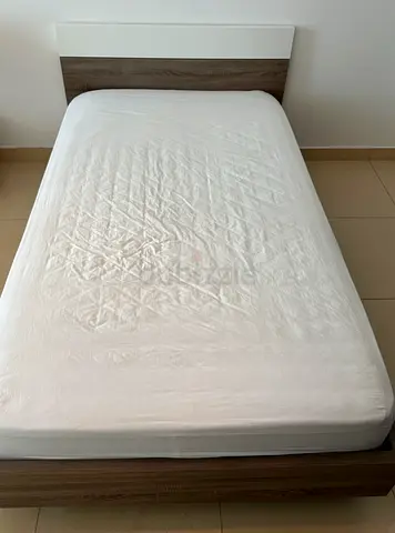 Single Bed with matress and bedside table