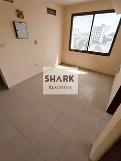 2BR apartment for annual rent in Al Nuaimiya 2, College Street. Master bedroom, 2 baths, central AC.