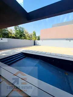 Standalone villa with a private pool in Masaar community.
