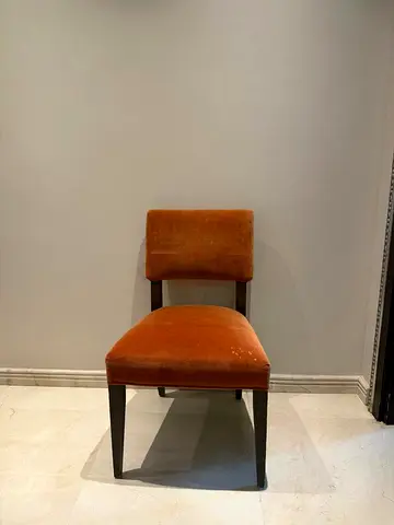Classic velvet dining chair in rust orange - single