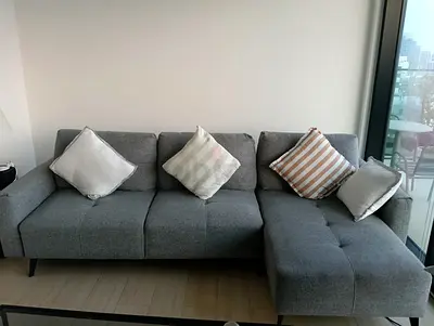 Grey L-shaped 3-seater sofa cum bed with chaise, good condition
