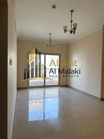 Spacious 3-Bedroom Family Apartment with Open View in Al Taawun