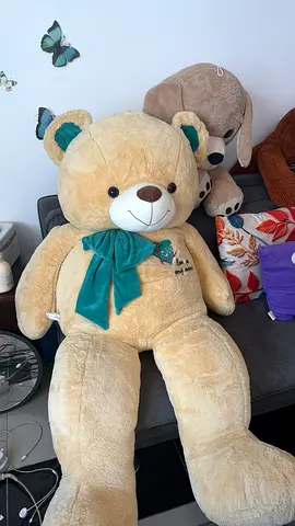 Large beige teddy bear with green bow - good condition