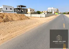 Residential and commercial land (G+1) for sale, freehold, in Al-Muweihat 3, Ajman