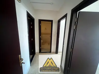 1-Bedroom Apartment with Balcony for Annual Rent in Al Rawda 3, Ajman | Family Building & Split AC