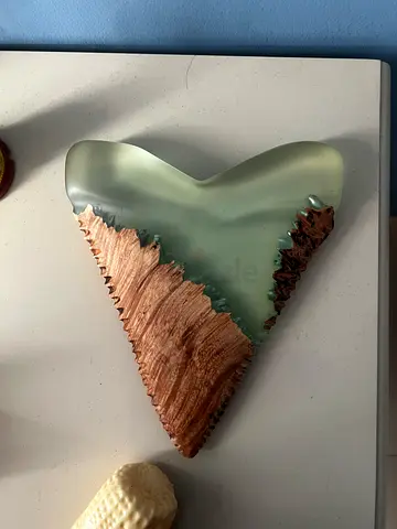 Handmade decorative resin and wood shark tooth ornament