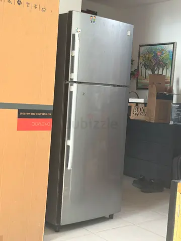 Silver Double-Door Refrigerator - Good Working Condition