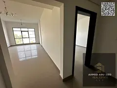 1BR Hall apartment for annual rent in Al Bustan, Liwara 2, Ajman; 2 bathrooms, built‑in wardrobes,