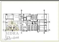 I’m going into a new residential-commercial building in Al Jurf, which is about 10% complete.