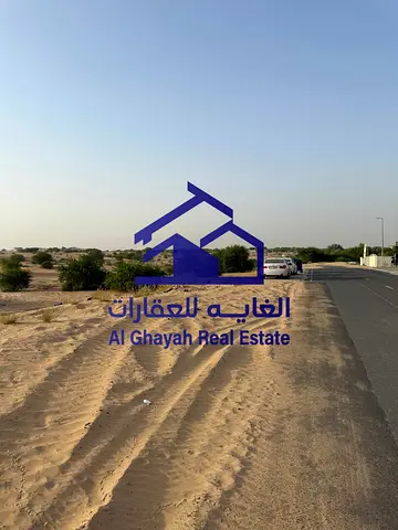 أرض جانب زاوية للبيع في حوشي – الشارقة