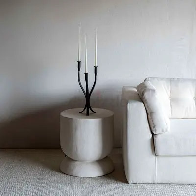 Small round plastered side table / accent stool in off-white