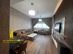 Luxury apartment, second occupancy. Two bedrooms, living room, and open balcony. Ajman One Tower. Fu
