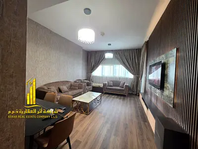 Luxury apartment, second occupancy. Two bedrooms, living room, and open balcony. Ajman One Tower. F
