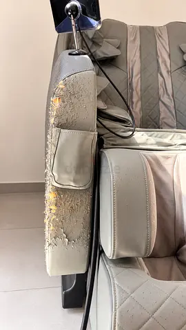Used massage chair with worn armrest - needs upholstery repair, but working in perfect condition