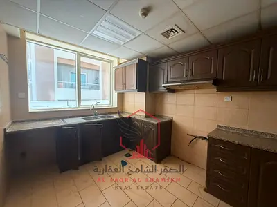 Spacious 2-Bedroom Apartment with a Master Bedroom, Balcony, Open View, One Month Free, and Free Gym for Annual Rent in Al Qasimia, Al Mahatta