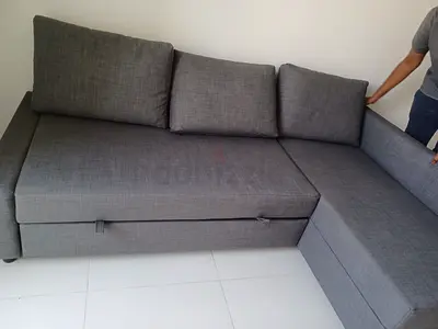 Urgent We are Selling Corner Sofa Bed with storage